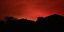 Κατακόκκινος ο ουρανός στην Αυστραλία από τις φωτιές 