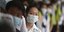 Πολίτες στην Κίνα με μάσκες προκειμένου να προφυλαχθούν από τη μετάδοση του κοροναϊού