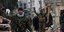 Στρατιώτες του καθεστώτος Άσαντ πανηγυρίζουν για τη νίκη στο Χαλέπι
