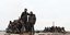 Σύροι αντάρτες ποζάρουν για τον φακό πάνω σε τανκ κοντά στο Χαλέπι