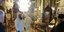 Άνδρες πραγματοποιούν απολύμανση στο εσωτερικό ναού στα πλαίσια εκτάκτων μέτρων ενάντια στον κορωνοϊό