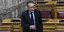 Ο αναπληρωτής υπουργός Μετανάστευσης και Ασύλου Γιώργος Κουμουτσάκος μιλά στη Βουλή από τα υπουργικά έδρανα