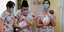 Ουκρανές νοσοκόμες κρατούν στην αγκαλιά τους μωρά από παρένθετες μητέρες