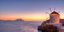 Ανεμόμυλος στην Αμοργό με φόντο το ηλιοβασίλεμα του Αιγαίου στην Ελλάδα