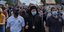 Αρχιεπίσκοπος Αμερικής Ελπιδοφόρος με μάσκα σε διαμαρτυρία