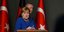 Η καγκελάριος Άνγκελα Μέρκελ και πίσω της, ο Τούρκος ομόλογός της Ρετζέπ Ταγίπ Ερντογάν
