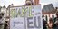 «Ντροπή σου ΕΕ» γράφει πλακάτ διαδηλωτή για το προσφυγικό