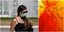 Καιρός: Μια κοπέλα με μάσκα στο συντριβάνι της Ομόνοιας