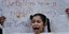 Κορίτσι από τη Συρία διαδηλώνει με τους Σύρους γονείς της έξω από τα κεντρικά των Ηνωμένων Εθνών