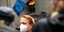 Άνδρας με μάσκα λόγω της πανδημίας του κορωνοϊού στην Γερμανία