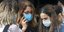 Τρεις γυναίκες με μάσκες κατά του κορωνοϊού