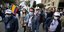 Πολίτες διαδηλώνουν στους δρόμους της Κολομβίας φορώντας μάσκες για τον κορωνοϊό