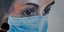 Γκράφιτι νοσοκόμας με μάσκα για τον κορωνοϊό