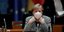 Η Ανγκελα Μέρκελ κάθεται στην θέση της σε συμβούλιο της ΕΕ