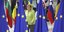 Η καγκελάριος Άνγκελα Μέρκελ μεταξύ σημαιών της ΕΕ