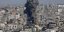Καπνοί από βομβαρδισμένο κτίριο στην Λωρίδα της Γάζας την ημέρα