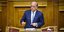 Ο υφυπουργός Οικονομικών Γιώργος Ζαββός μιλάει από το βήμα της Βουλής