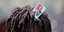 Άνδρας στην Αϊτή με την εικόνα του δολοφονηθέντος προέδρου της χώρας στα μαλλιά