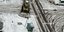 Μπουλντόζα σε δρόμο στη Νέα Σμύρνη καθαρίζει τα χιόνια