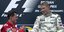 Schumacher και Ηakkinen στο πόντιουμ, μετά το θρυλικό αγώνα του 2000 στο Σπα