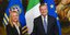 Ο απερχόμενος πρωθυπουργός της Ιταλίας Μάριο Ντράγκι, δεξιά, σφίγγει το χέρι με τη νέα πρωθυπουργό Τζόρτζια Μελόνι