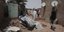 Σουδανοί σε κατεστραμμένη από τις μάχες συνοικία του Χαρτούμ