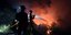 Ισπανοί πυροσβέστες παλεύουν με τις φλόγες στο νησί Λα Πάλμα-Φωτογραφία Ap Images