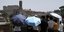 Τουρίστες στη Ρωμαϊκή Αγορά εν μέσω καύσωνα στην πρωτεύουσα της Ιταλίας