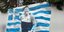 Η τοιχογραφία με τον Εμμανουήλ Καραλή να πανηγυρίζει 