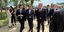In the center, the Greek Minister of Environment and Energy, Stavros Papastavrou