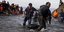 Migrants and refugees arrive on a dinghy 