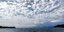 Clear skies with local showers and thunderstorms on Monday