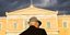 Αn elderly man outside the Parliament