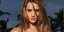 Ξέγνοιαστες στιγμές με τη Rosie Huntington και το σκυλάκι της στην παραλία [εικό