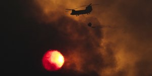 AP Photo/Petros Giannakouris
