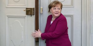 Η Ανγκελα Μέρκελ θέλει να συναντήσει σύντομα τον Βλαντιμίρ Πούτιν (Φωτογραφία: AP/ Michael Sohn)