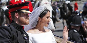 Ο πρίγκιπας Χάρι και η Μέγκαν Μαρκλ στον γάμο /Φωτογραφία: AP