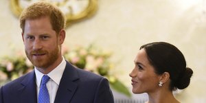 Ο πρίγκιπας Χάρι και η Μέγκαν Μαρκλ /Φωτογραφία: AP/Clodagh Kilcoyne