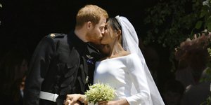 Ο πρίγκιπας Χάρι και η Μέγκαν Μαρκλ στον γάμο /Φωτογραφία: AP