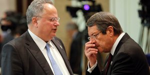 Νίκος Κοτζιάς & Νίκος Αναστασιάδης (Φωτογραφία: Damir Sagolj/Pool Photo via AP)