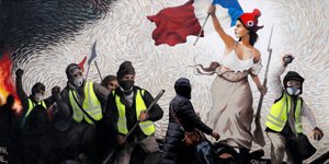 Tα «Κόκκινα Φουλάρια» αντιδρούν στα βίαια επεισόδια που προκαλούνται κατά τις διαμαρτυρίες των Κίτρινων Γιλέκων (Φωτογραφία: ΑΡ/Christophe Ena)