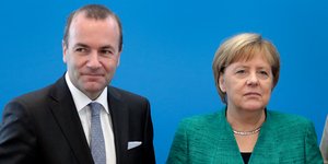 H Γερμανίδα καγκελάριος Μέρκελ κι ο υποψήφιος του ΕΛΚ για την Κομισιόν, Βέμπερ