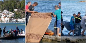 Ανδρες του Λιμενικού μεταφέρουν στην ξηρά σορό επιβαίνοντα στο μοιραίο ελικόπτερο