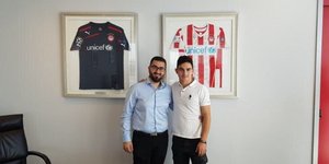 Ο Ιωάννης Κωστή με τον μάνατζερ του