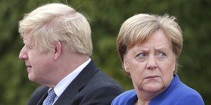 Ο Βρετανός πρωθυπουργός Μπόρις Τζόνσον και η Ανγκελα Μέρκελ