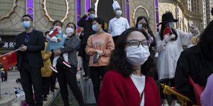 Κινέζοι με μάσκες