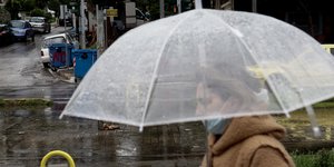 Γυναίκα με ομπρέλα