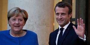 Ανγκελα Μέρκελ και Εμανουέλ Μακρόν 