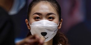 Γυναίκα στην Κίνα με μάσκα