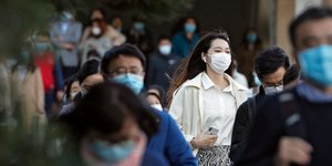 Κινέζοι με μάσκα